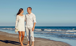 Newlywed couple on the beach